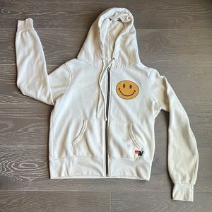 Aviator Nation smiley zip front cream sweatshirt. Size XS